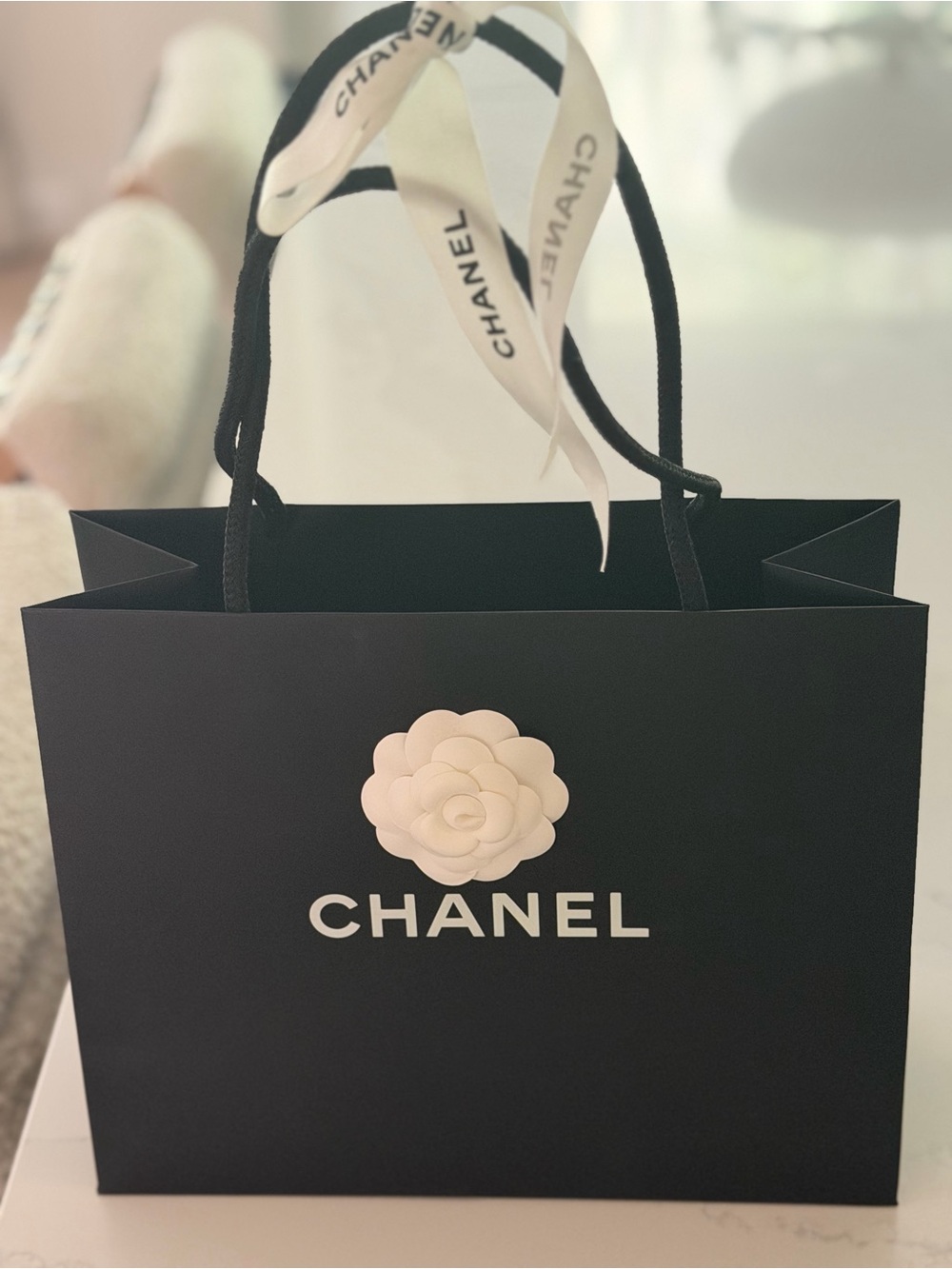 CHANEL Black Shopping Bag with White Camellia and Chanel Ribbon